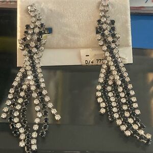 Verite brand earrings are rhinestone dangle earrings